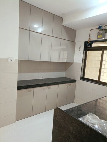 Kitchen in 2 BHK Apartment at Acme Ozone, Manpada – for Rent