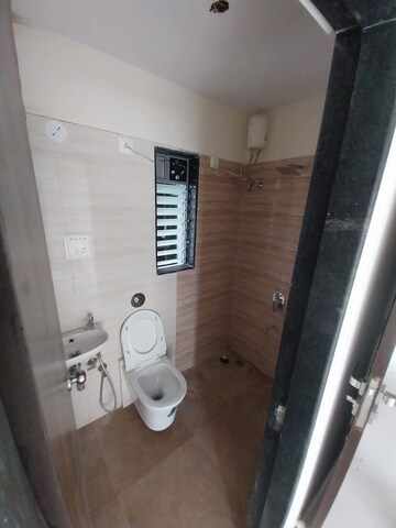 Bathroom in 2 BHK Apartment at Sunteck West World, Naigaon East – for Rent