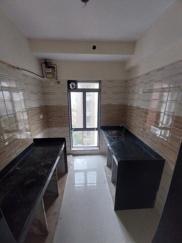 Kitchen in 2 BHK Apartment at Sunteck West World, Naigaon East – for Rent