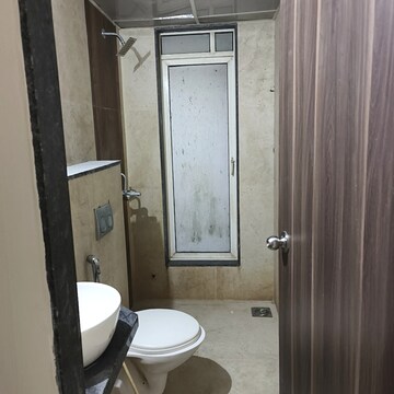 Bathroom in 2 BHK Apartment at JK Iris, Mira Road – for Rent