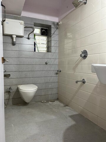 Bathroom in 1 BHK Apartment at Satyam CHS Naupada, Naupada – for Rent