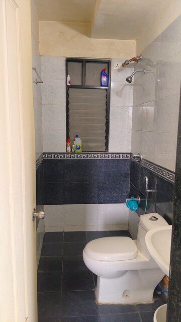 Bathroom in 2 BHK Apartment at Sarang Nanded City, Sinhagad – for Rent
