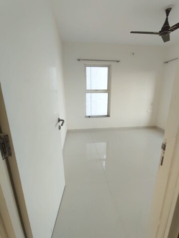 Bedroom in 2 BHK Apartment at Adhiraj Capital City Tower Meraki, Kharghar – for Rent