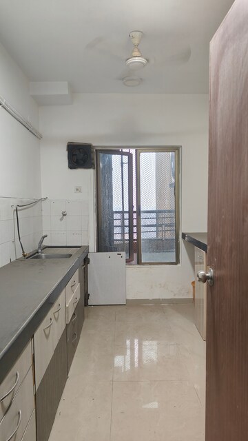 Kitchen in 2.5 BHK Apartment at Oberoi Springs, Andheri West – for Sale