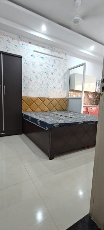 Bedroom in 1 RK Builder Floor at Ansal Sushant Lok I, Sector 43 – for Rent