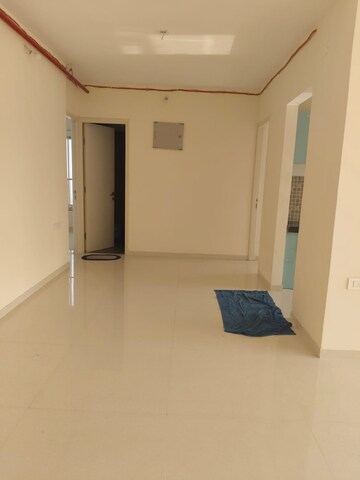 Living Room in 2 BHK Apartment at Adhiraj Capital City Tower Meraki, Kharghar – for Rent