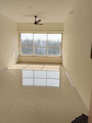 Living Room in 2 BHK Apartment at Adhiraj Capital City Tower Meraki, Kharghar – for Rent