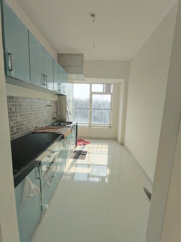 Kitchen in 2 BHK Apartment at Adhiraj Capital City Tower Meraki, Kharghar – for Rent