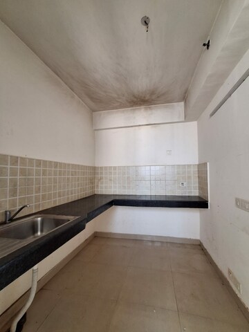 Kitchen in 2 BHK Apartment at Ramprastha City The Edge Towers, Sector 37d – for Sale
