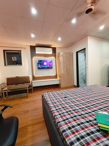 Bedroom in 1 RK Builder Floor at Ansal Sushant Lok I, Sector 43 – for Rent