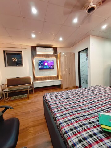 Bedroom in 1 RK Builder Floor at Ansal Sushant Lok I, Sector 43 – for Rent