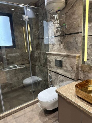 Bathroom in 4 BHK Apartment at Ansal API Versalia, Sector 67a – for Sale