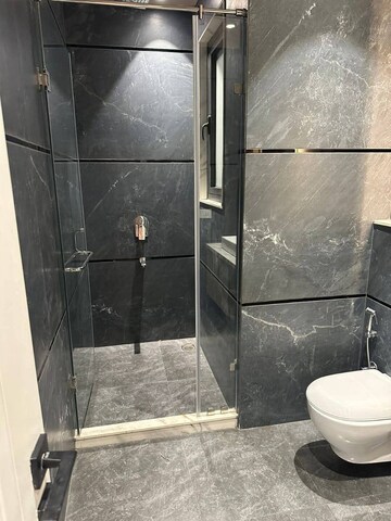 Bathroom in 4 BHK Apartment at Ansal API Versalia, Sector 67a – for Sale