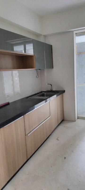 Kitchen in 2.5 BHK Apartment at Ekta Tripolis, Goregaon West – for Rent