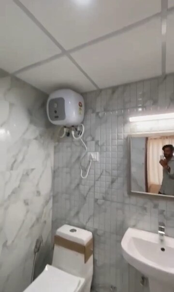 Bathroom in Studio Apartment at Alpha 1 Greater Noida – for Sale