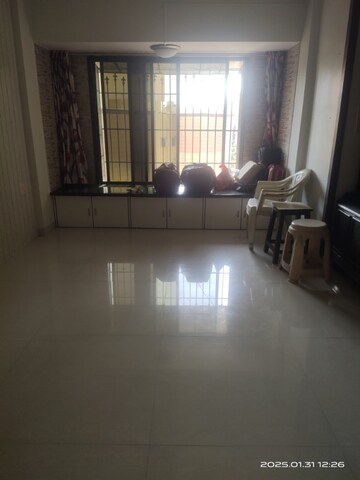 Living Room in 2 BHK Apartment at Vedant Complex CHS, Samata Nagar – for Rent