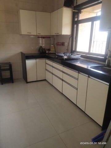 Kitchen in 2 BHK Apartment at Vedant Complex CHS, Samata Nagar – for Rent