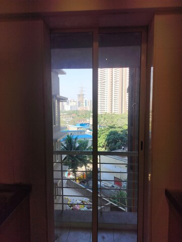 Room in 2 BHK Apartment at Ekta Tripolis, Goregaon West – for Rent