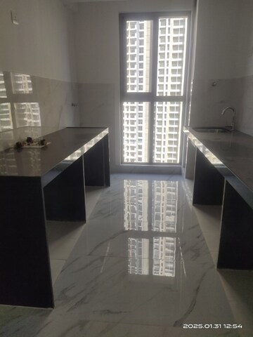 Kitchen in 2 BHK Apartment at Raymond Ten X Vibes, Jk Gram – for Rent