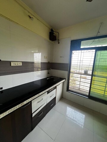 Kitchen in 2 BHK Apartment at Ghansoli Sector 15 – for Rent