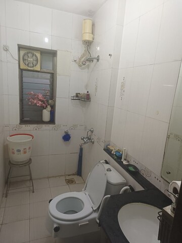 Bathroom in 2 BHK Apartment at Evershine Cosmic, Andheri West – for Rent
