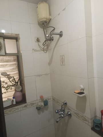 Bathroom in 2 BHK Apartment at Evershine Cosmic, Andheri West – for Rent