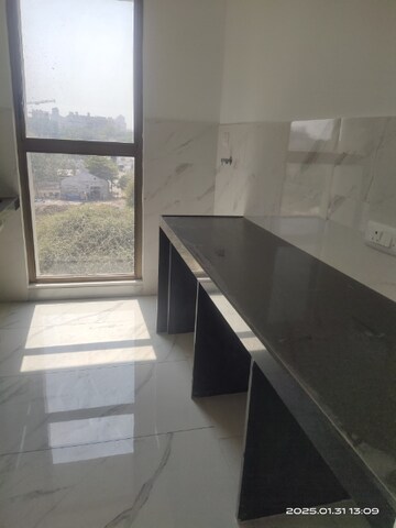 Kitchen in 2 BHK Apartment at Raymond Ten X Vibes, Jk Gram – for Rent