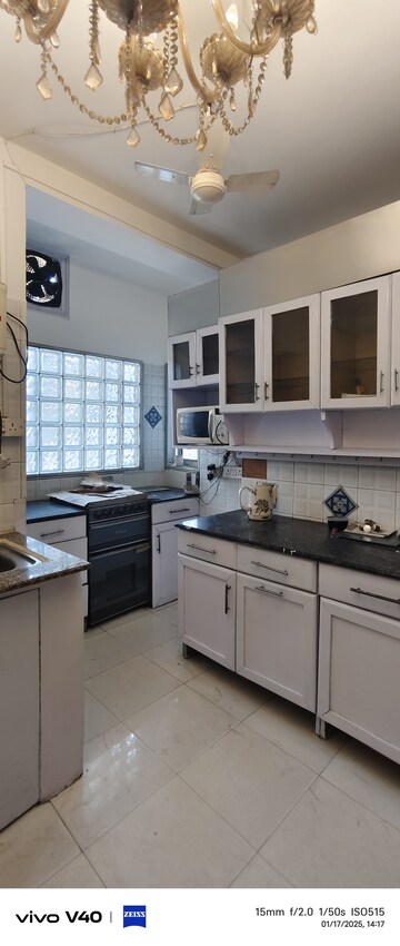 Kitchen in 1.5 BHK Apartment at Defence Colony – for Rent