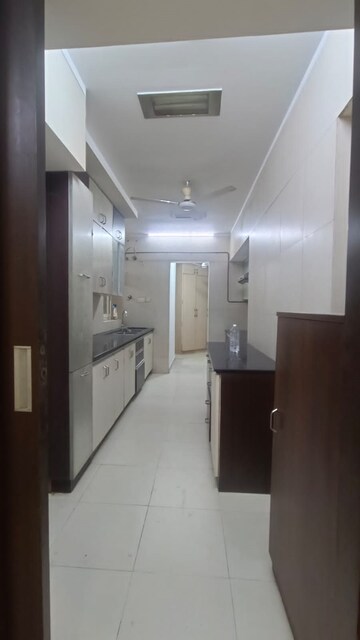 Kitchen in 4 BHK Apartment at Lokhandwala Whispering Palms XXclusives, Kandivali East – for Sale