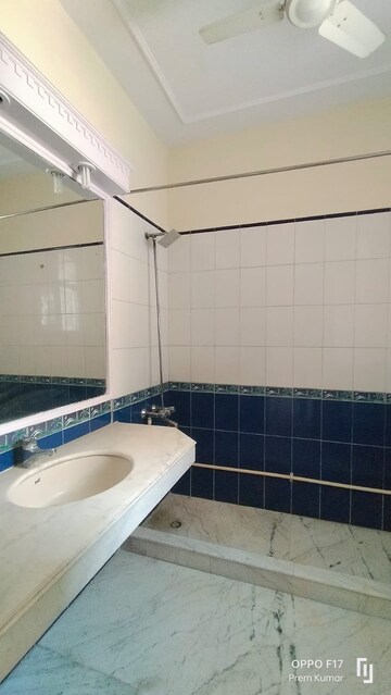 Bathroom in 4 BHK Apartment at Defence Colony – for Rent