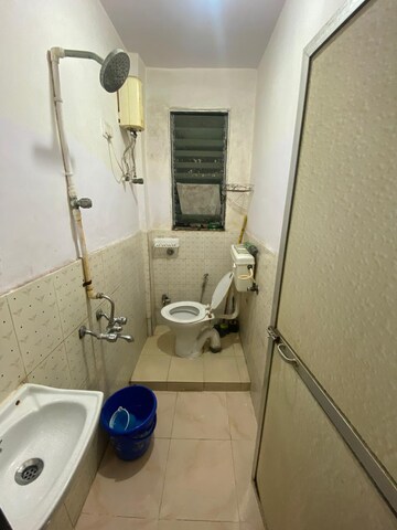 Master Bedroom in 1 RK Apartment at Arihant Tower Vakola, Santacruz East – for Sale