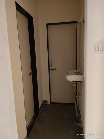 Building Lobby in 1 BHK Apartment at Wadgaon Sheri – for Rent