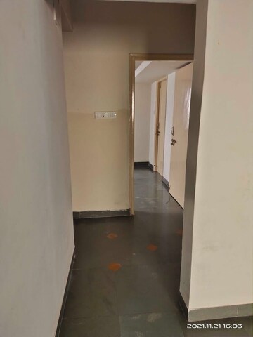 Building Lobby in 1 BHK Apartment at Wadgaon Sheri – for Rent
