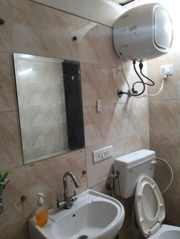 Bathroom in 2 BHK Apartment at Gaur City 7th Avenue, Sector 4, Greater Noida – for Rent