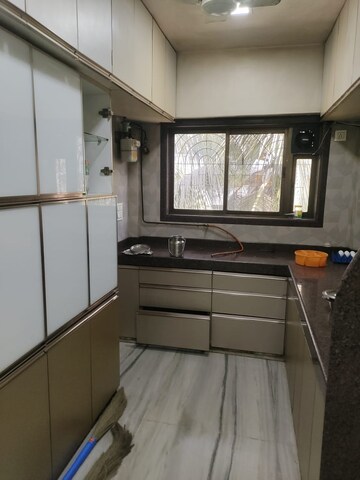 Kitchen in 2 BHK Apartment at Yashodhan Apartments Andheri, Andheri West – for Rent
