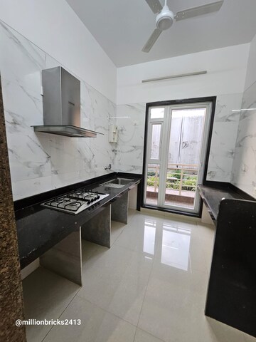 Kitchen in 2 BHK Apartment at Paradise Sai World Empire, Kharghar – for Rent