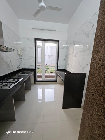 Kitchen in 2 BHK Apartment at Paradise Sai World Empire, Kharghar – for Rent