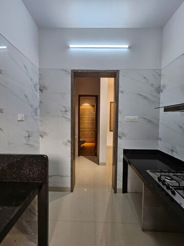 Kitchen in 2 BHK Apartment at Paradise Sai World Empire, Kharghar – for Rent
