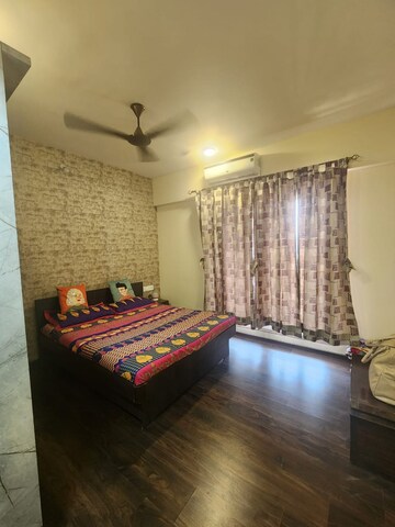 Bedroom in 2 BHK Apartment at Paradise Sai World City Phase 2, New Panvel – for Rent
