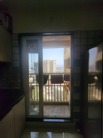 Room in 2 BHK Apartment at Paradise Sai World City Phase 2, New Panvel – for Rent