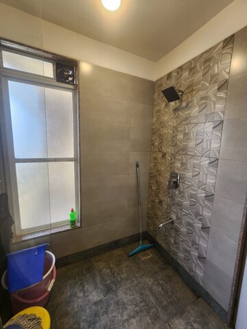 Bathroom in 2 BHK Apartment at Paradise Sai World City Phase 2, New Panvel – for Rent