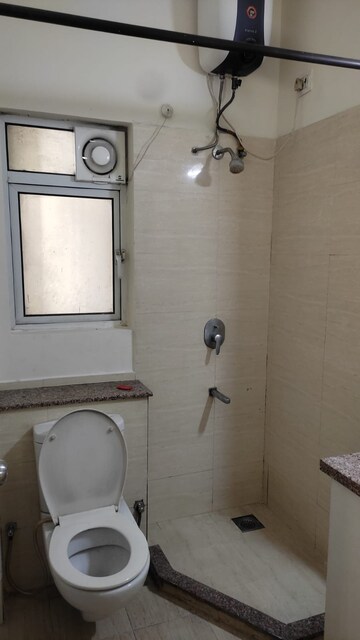 Bathroom in 3 BHK Apartment at Moti Nagar – for Rent