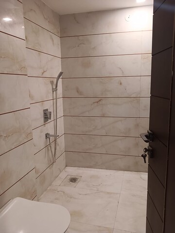Bathroom in 4 BHK Builder Floor at Ansal Sushant Lok I, Sector 43 – for Sale