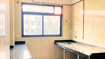 Kitchen in 2 BHK Apartment at Kumar Mangal CHS, Mulund East – for Sale