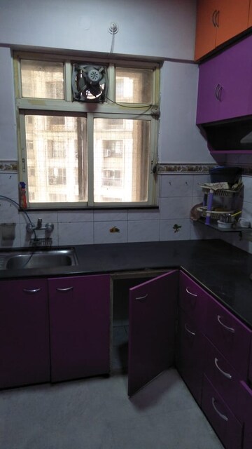 Kitchen in 2 BHK Apartment at Hiranandani Gardens Glen Height, Powai – for Rent