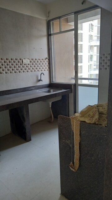 Kitchen in 1 BHK Apartment at Ajmera New Era, Kalyan West – for Rent