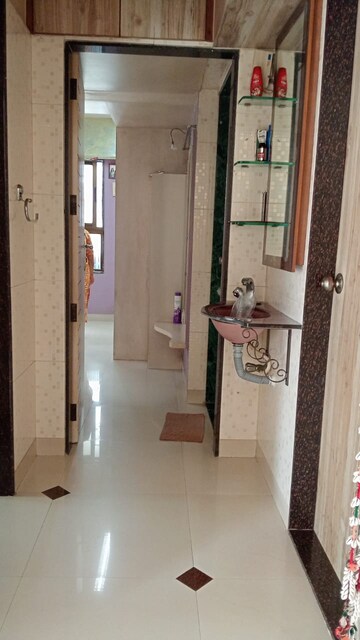 Living Room in 1 BHK Apartment at Andheri West – for Sale