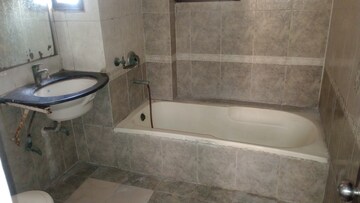 Bathroom in 2 BHK Apartment at Prateek Grand City, Siddharth Vihar – for Rent