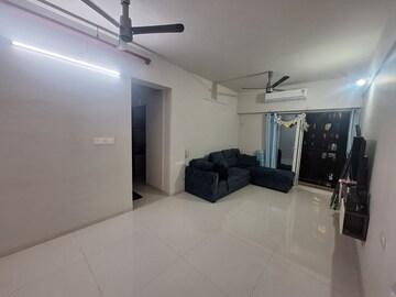 Living Room in 2 BHK Apartment at Rustomjee Azziano Wing I, Majiwada – for Rent