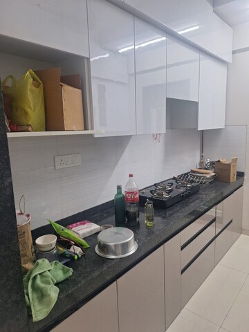 Kitchen in 2 BHK Apartment at Rustomjee Azziano Wing I, Majiwada – for Rent